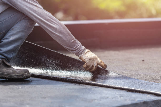 Professional Emergency Waterproofing technician working in Sioux Center, IA